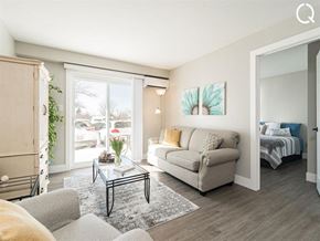 Dieppe apartment for rent - a living room with a couch and a table