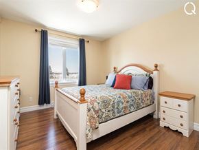 Dieppe apartment for rent - a bedroom with a bed and a window