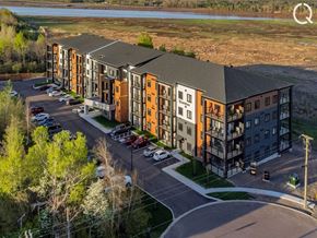 Dieppe apartment for rent - an aerial view of an apartment complex with a river in the background