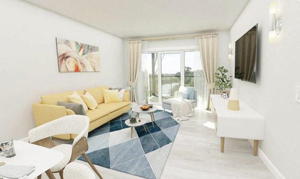 Moncton apartment for rent - a living room with a couch and a table