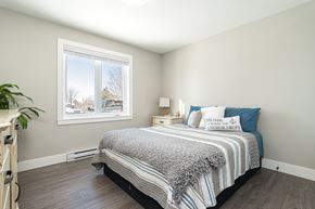 Dieppe apartment for rent - a bedroom with a bed and a window