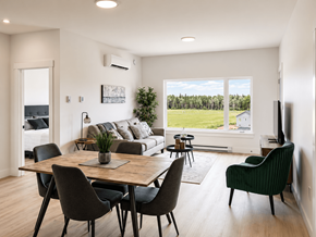 Dieppe apartment for rent - A modern dining room with a wooden table and chairs.