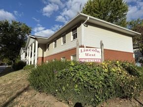 Petersburg apartment for rent - A building with a sign that says Lincoln West Apartments.