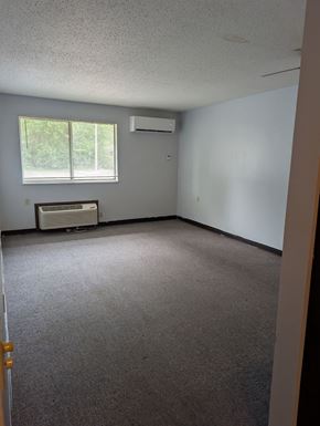 Canton apartment for rent - A room with a window and an air conditioner.
