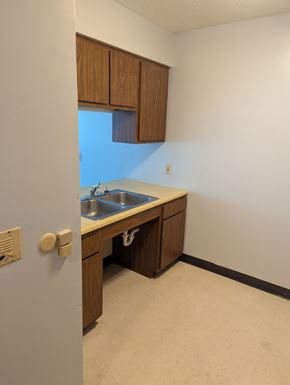 Canton apartment for rent - A kitchen with a sink and cabinets.