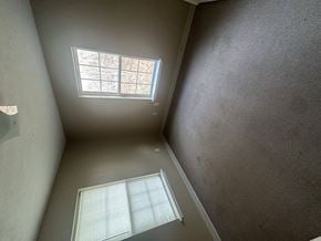 West Liberty townhouse for rent - A room with a window and a skylight.