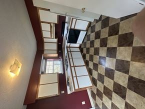 West Liberty townhouse for rent - A staircase with a checkered floor pattern.
