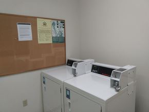 Mt. Carmel apartment for rent - A white cabinet with a brown board on the wall above it.