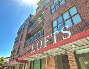 Seattle apartment for rent - a building with a sign on the side of it