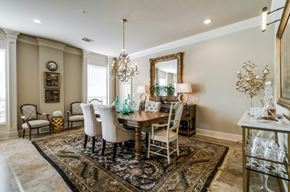 Dallas apartment for rent - A dining room with a table set for six.