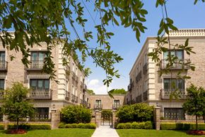 Dallas apartment for rent - A building with a gate in front of it.