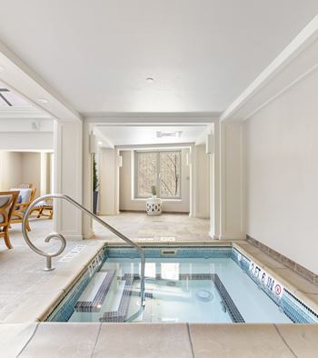 A swimming pool in a lobby of a hotel
