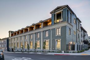 Berkeley apartment for rent - A large building with a balcony on the top floor is shown.