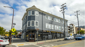 Berkeley apartment for rent - A street view of a building with the sign "War Horse Tattoo" on it.