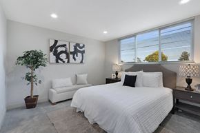 Belmont apartment for rent - a bedroom with a large bed next to a window