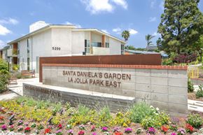 San Diego apartment for rent - a sign for the parks garden in front of a building