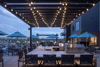 Pool terrace with lawn games and lounge areas
