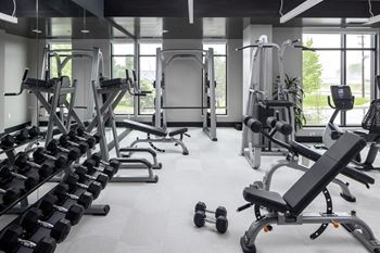 Fitness center with high-end precor workout equipment and separate group fitness studio