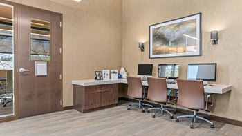 Business center with desk, chair and table