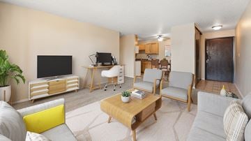 Rapid City apartment for rent - a living room with furniture and a television