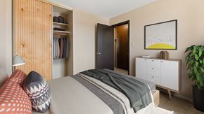 Rapid City apartment for rent - a bedroom with a bed and a closet