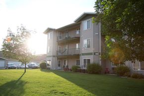 Bismarck apartment for rent - Exterior of Cottonwood Apartment Homes with spacious balconies and patios.