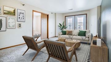 Billings apartment for rent - a living room with a couch and a table and two chairs