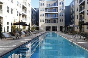 Denver apartment for rent - Lap Pool and Chairs at Dylan at RiNo, Denver, CO, 80216