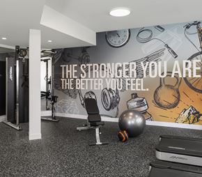 Rochester apartment for rent - A gym room with a motivational quote on the wall.