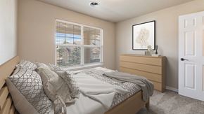 Rapid City apartment for rent - an empty bedroom with a bed and a window
