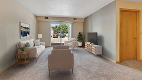 Monticello apartment for rent - a living room with a couch and chairs and a television