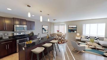 Bismarck apartment for rent - a kitchen and living room with a table and chairs