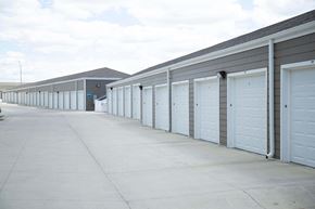 Bismarck apartment for rent - Large driveway with detached garage parking available.