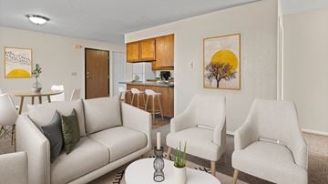 Billings apartment for rent - a living room with couches and chairs and a table