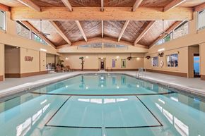 Plymouth apartment for rent - A large indoor swimming pool with a glass bottom.