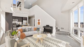 A living room with a couch and a table