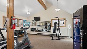 Billings apartment for rent - the gym has plenty of cardio equipment and a flat screen tv