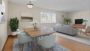 Billings apartment for rent - a living room with a table and chairs and a couch
