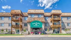 Billings apartment for rent - a large apartment building with a green sign in front of it