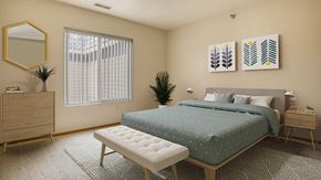 Billings apartment for rent - a bedroom with a bed and a dresser and a window