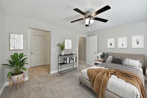 Omaha apartment for rent - Bedroom with Bed and Fan