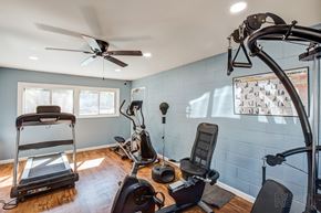 Morris apartment for rent - A home gym with a treadmill, exercise bike, and other equipment.
