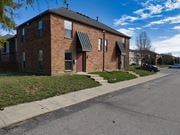 Trotwood apartment for rent - a brick apartment building on the corner of a street