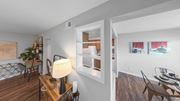 Indianapolis apartment for rent - a dining room with a table and chairs and a window