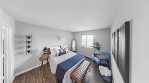 Indianapolis apartment for rent - a bedroom with a large bed and a window