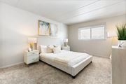 Matteson apartment for rent - a bedroom with a bed and a window
