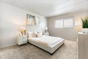 Matteson apartment for rent - a bedroom with a bed and a window