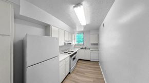 Fort Wayne apartment for rent - White Kitchen at Wood Creek Apartments, Fort Wayne, IN, 46835