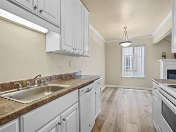South San Francisco apartment for rent - a kitchen with white cabinets and a sink
