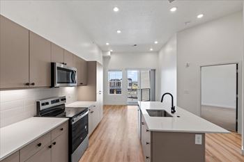 Kitchen with brown cabinets
